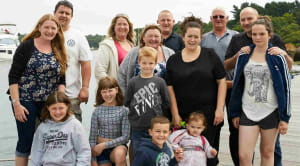 Boundless camping and caravan group: family at campsite